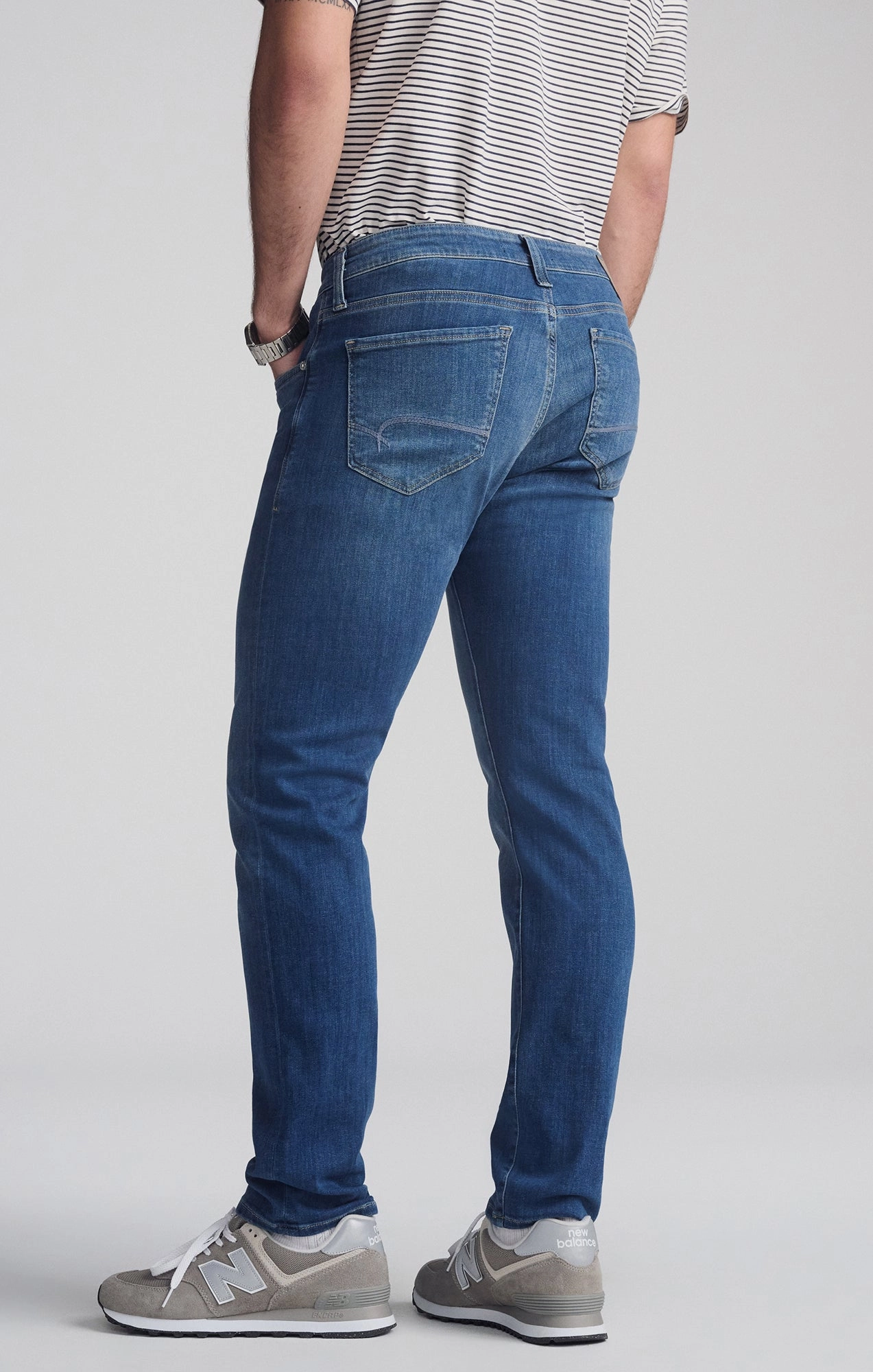 JAKE SLIM LEG IN MID FOGGY FEATHER BLUE