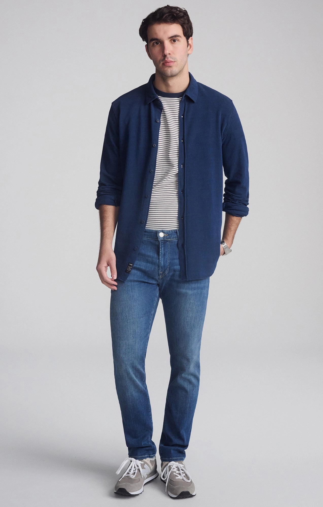 JAKE SLIM LEG IN MID FOGGY FEATHER BLUE