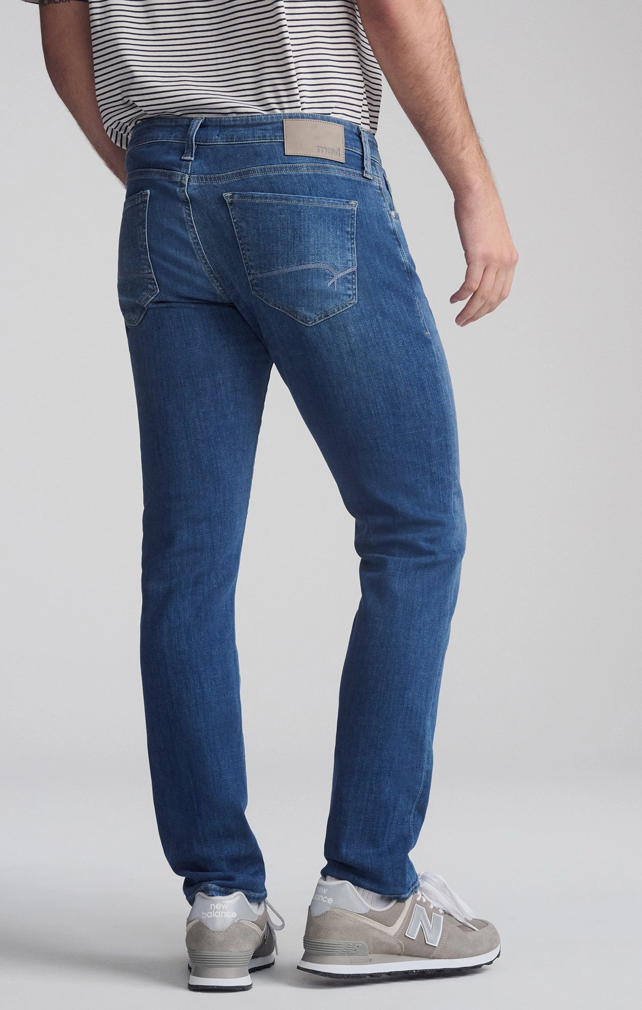 JAKE SLIM LEG IN MID FOGGY FEATHER BLUE