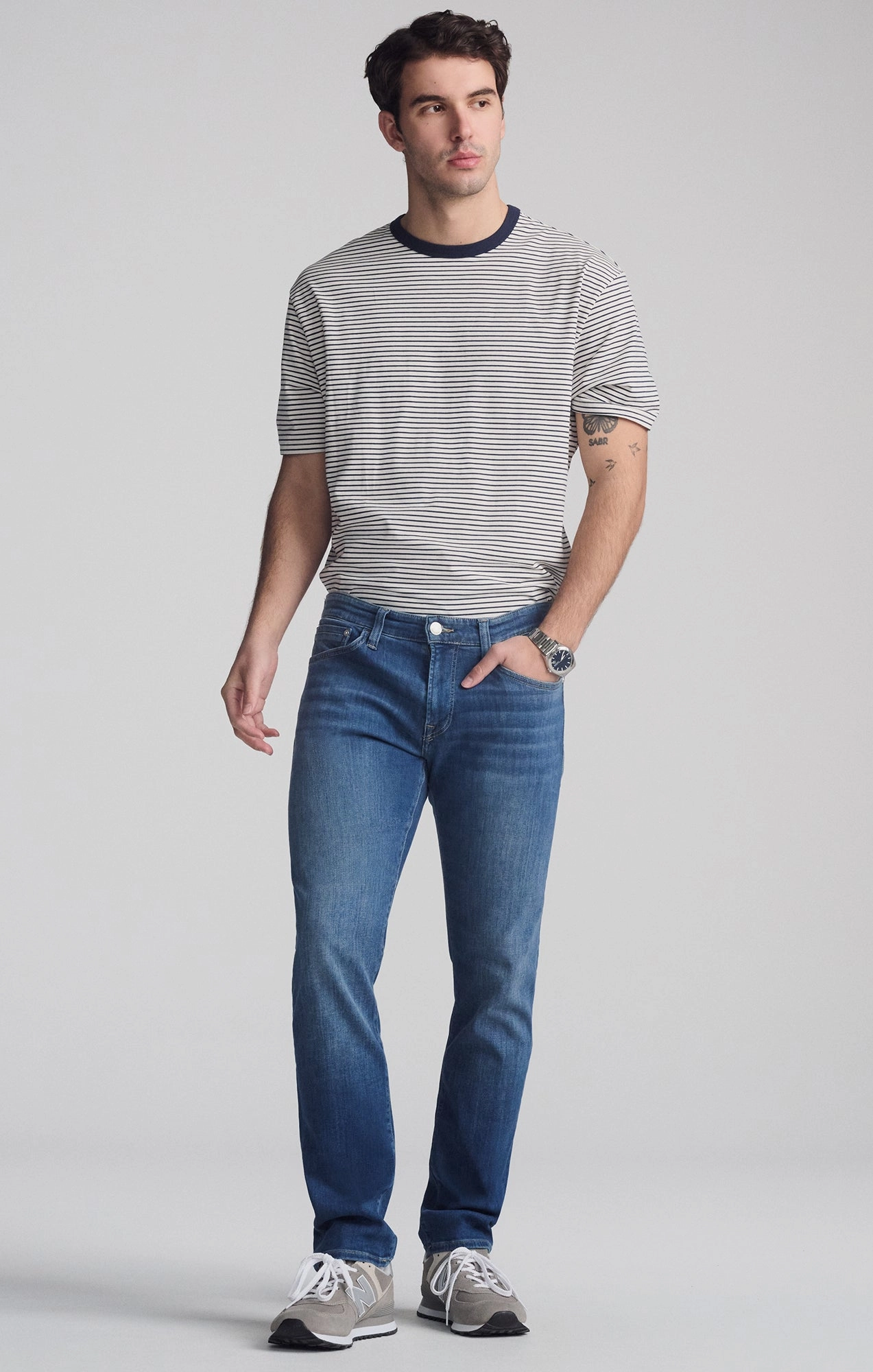 JAKE SLIM LEG IN MID FOGGY FEATHER BLUE